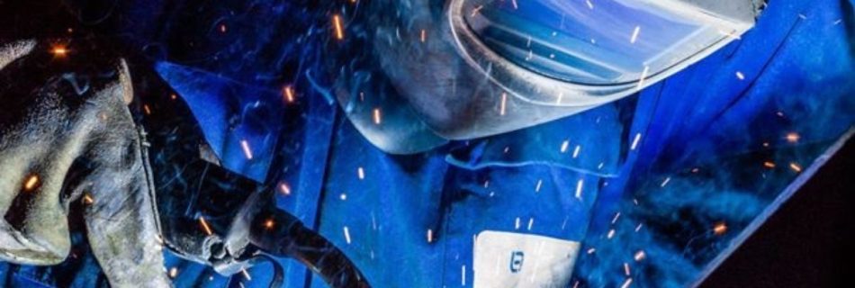 a person welding some metal